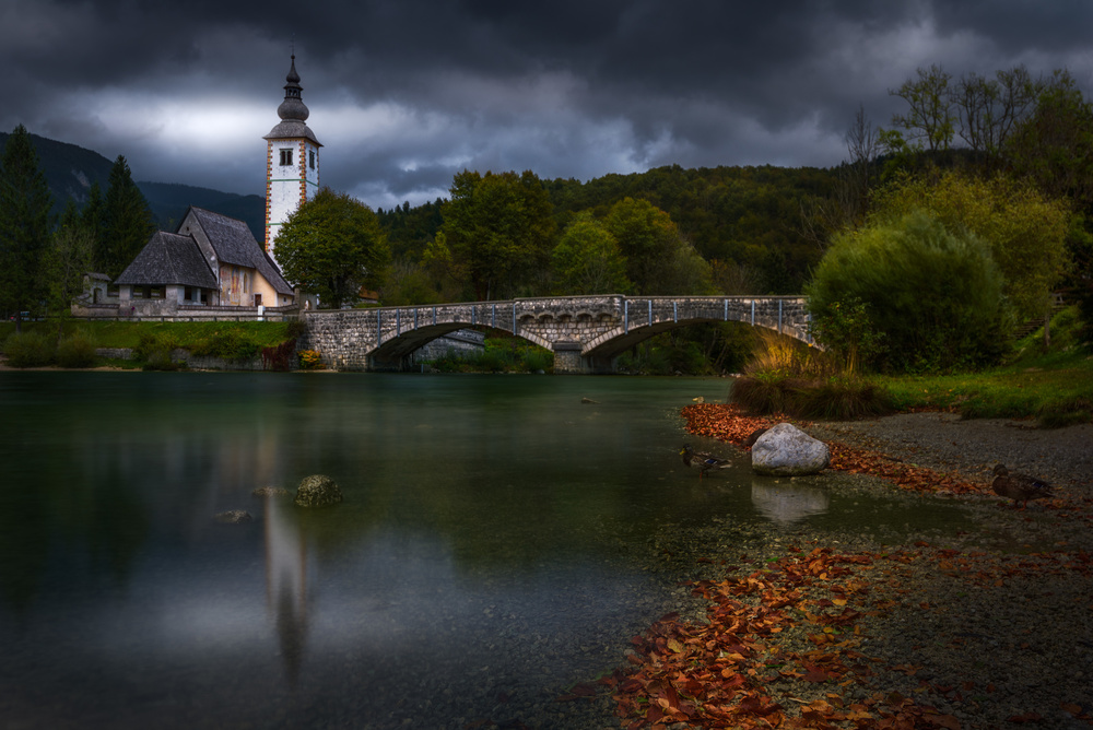 Dramatic Autumn River Church by SANDEEP MATHUR — canvas wall art