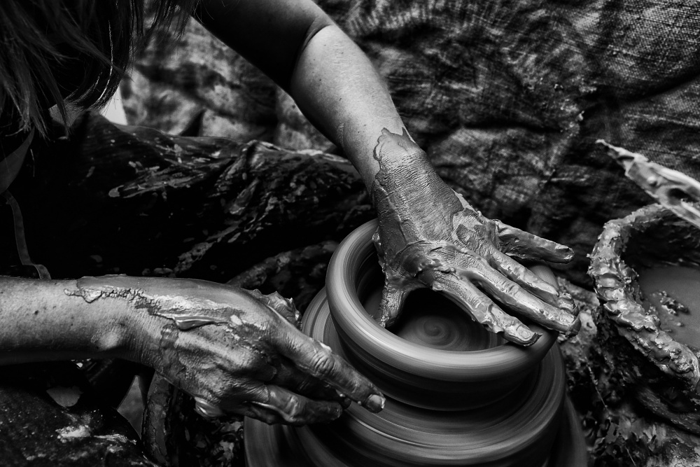 Potter's Hands At Work by Manu Allicot — canvas wall art