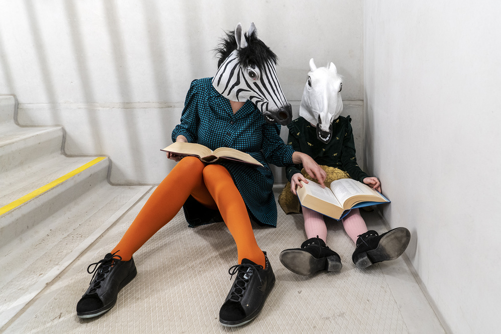 Whimsical Masked Readers by Ton Dirven — canvas wall art