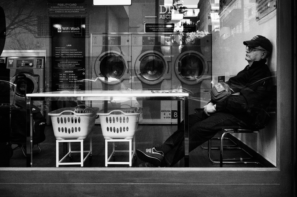 Laundromat Man Resting by Riccardo Lucidi — canvas wall art