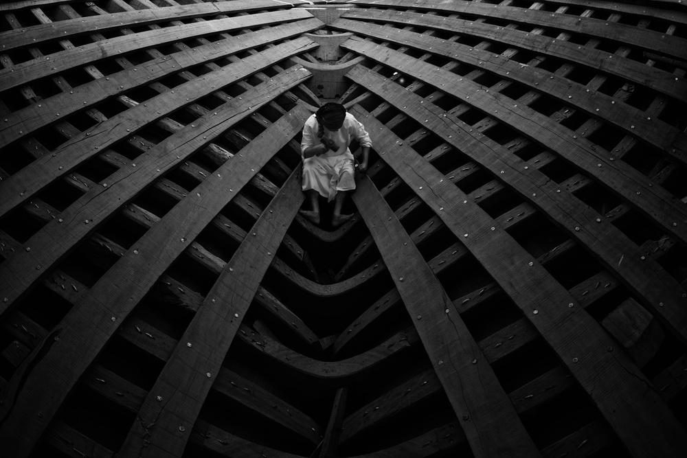 Solitary Figure Boat Frame by Haitham AL Farsi — canvas wall art