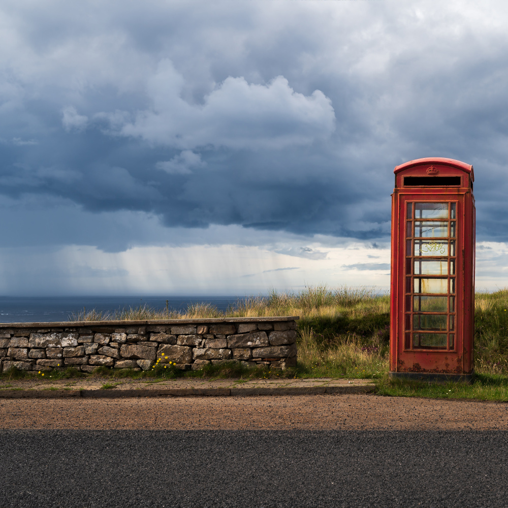 Red Booth Stormy Coast by Caroline Bomers — canvas wall art