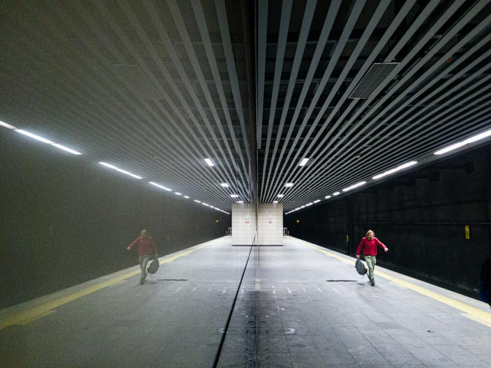 Lone Figure Metro Reflection by Doruk Uysal — canvas wall art
