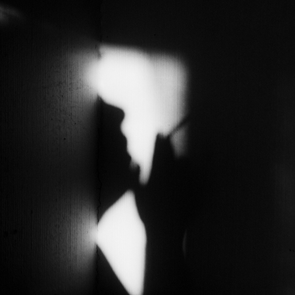 Mysterious Shadow Figure by Lilianna Hakhverdyan — canvas wall art