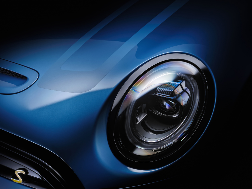 Sleek Blue Car Headlight by Rafal R. Nebelski — canvas wall art