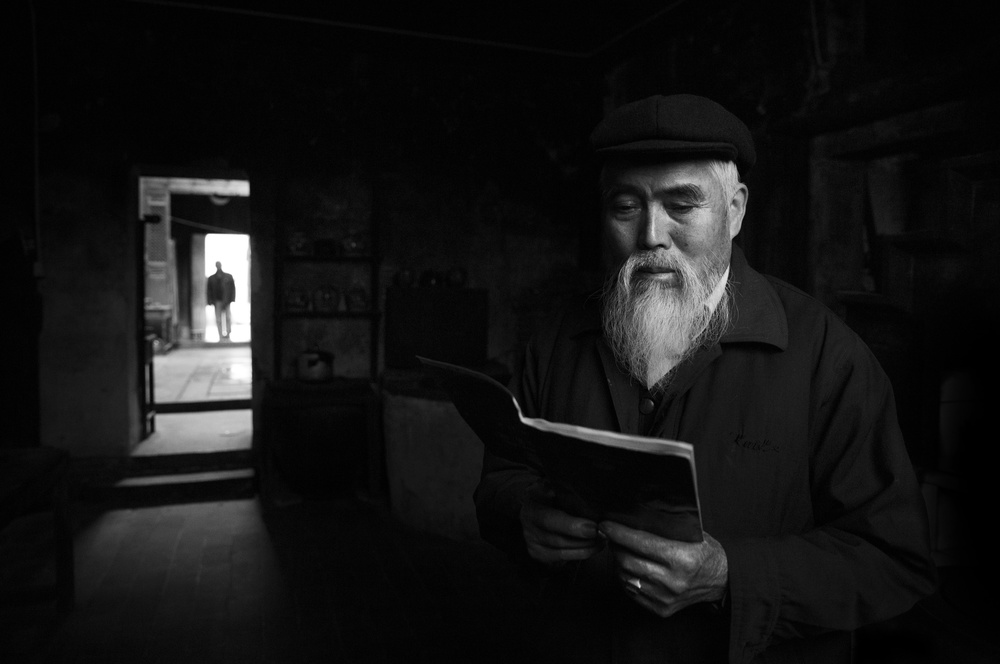 Thoughtful Man Reading by Ali Al-Jazeri — canvas wall art