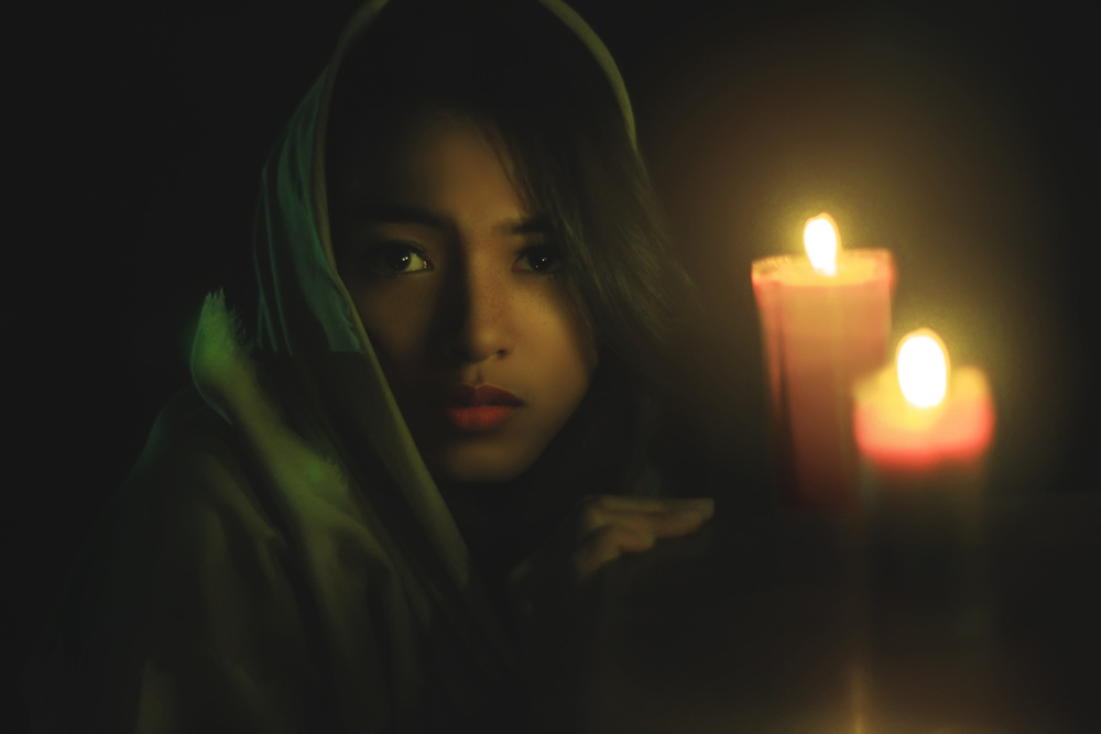 Pensive Candlelight Portrait by Heru Sulistyono — canvas wall art