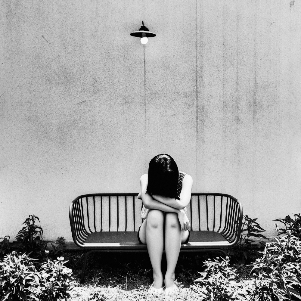Sad Girl Under Light by Parole Kim — canvas wall art