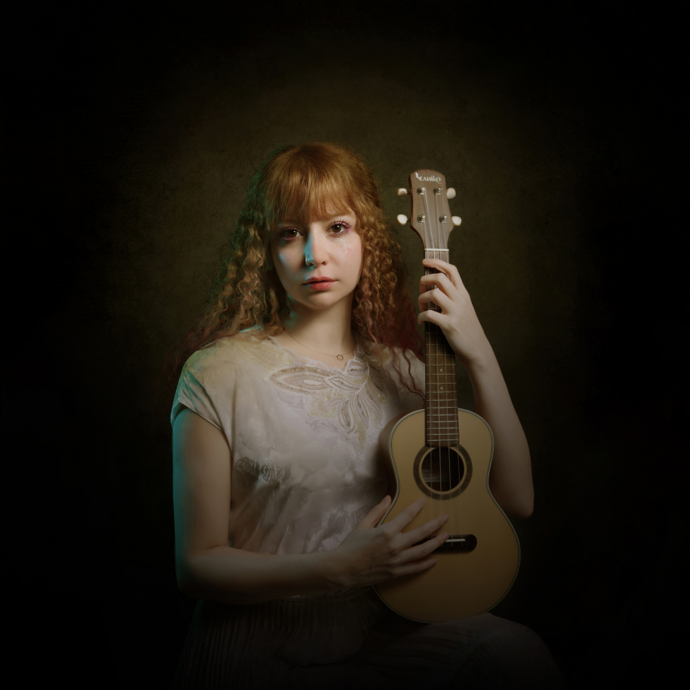 Pensive Woman With Ukulele by Moein Hasheminasab — canvas wall art