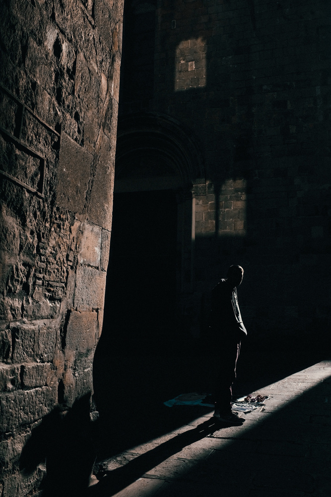 Man in Shadowed Alley by Ignasi Raventos — canvas wall art