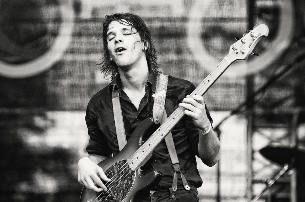 Intense Bass Player by Samir Pajic — canvas wall art