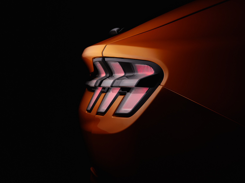 Sleek Orange Car Lights by Rafal R. Nebelski — canvas wall art