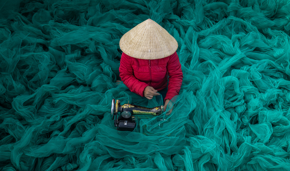 Woman Mending Fishing Nets by G. KIRAN KUMAR REDDY — canvas wall art