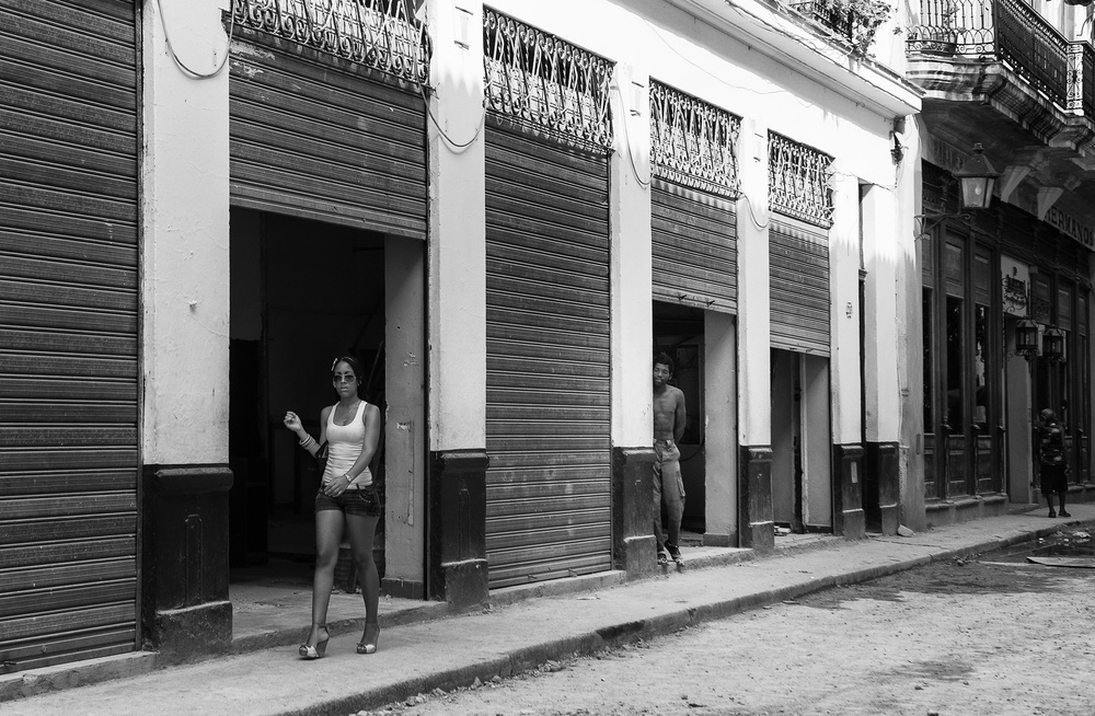 Woman in Havana Doorway by Andrei Nicolas - The Traveler — canvas wall art
