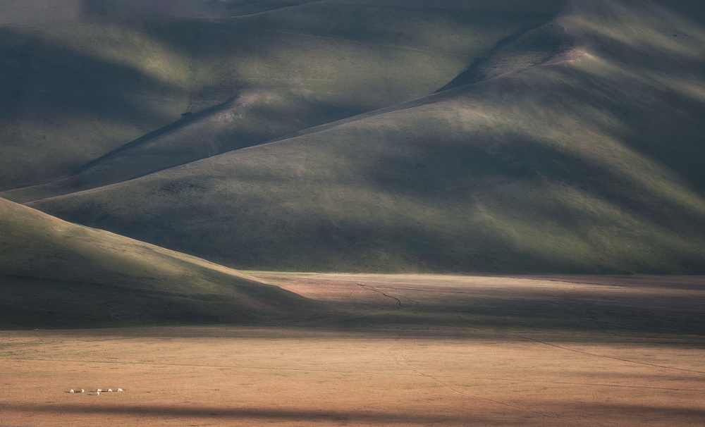 Light Across Rolling Hills by Roberto Marchegiani — canvas wall art