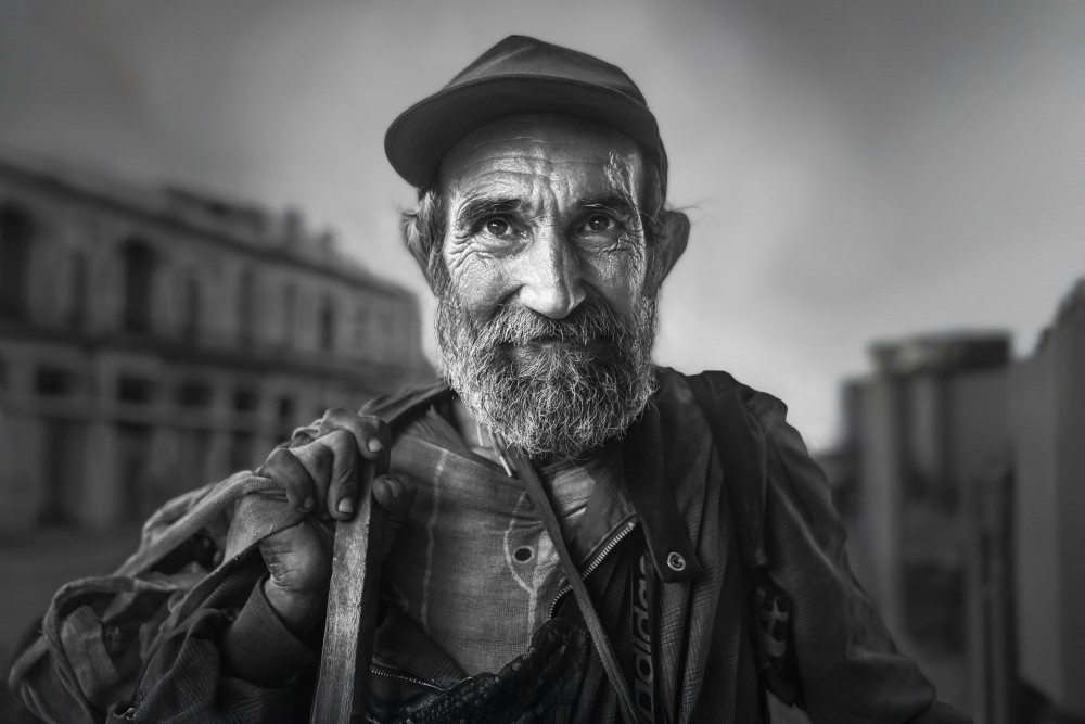 Smiling Man's Gaze by Leah Xu — canvas wall art