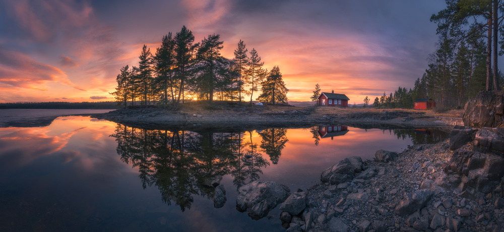 Red Cabin Lake Reflection by Ole Henrik Skjelstad — canvas wall art