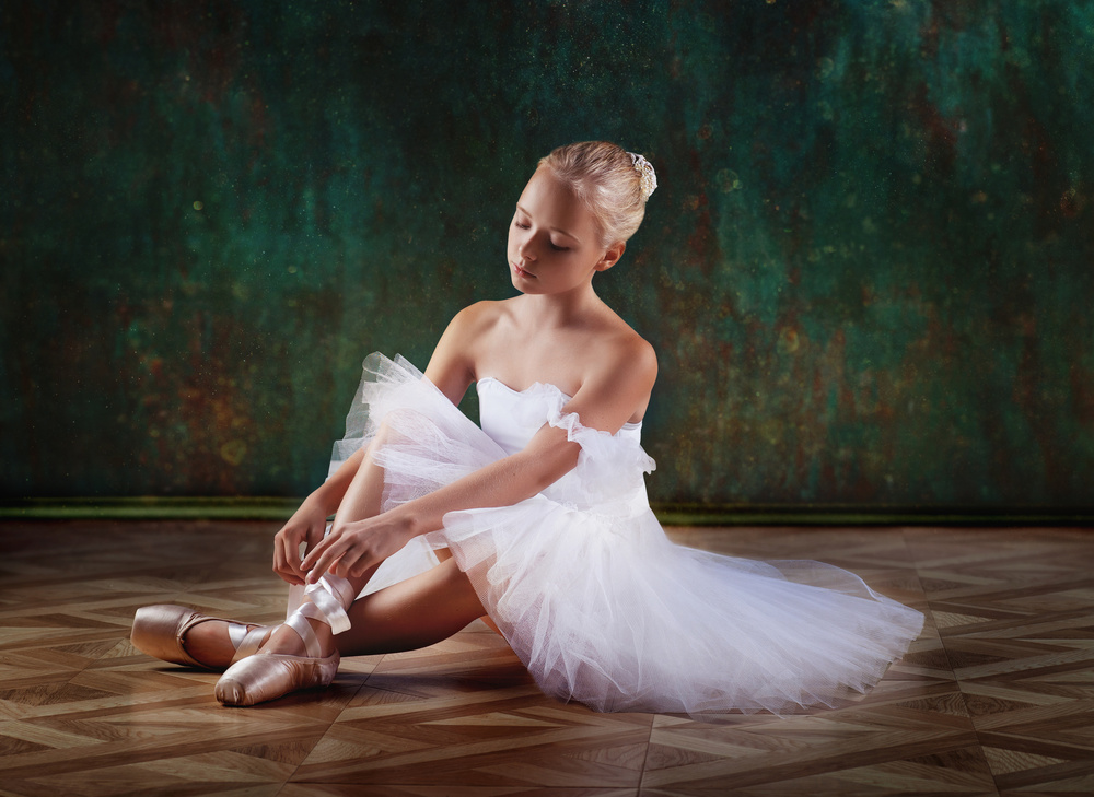 Ballerina Tying Pointe Shoes by Alina Lankina — canvas wall art