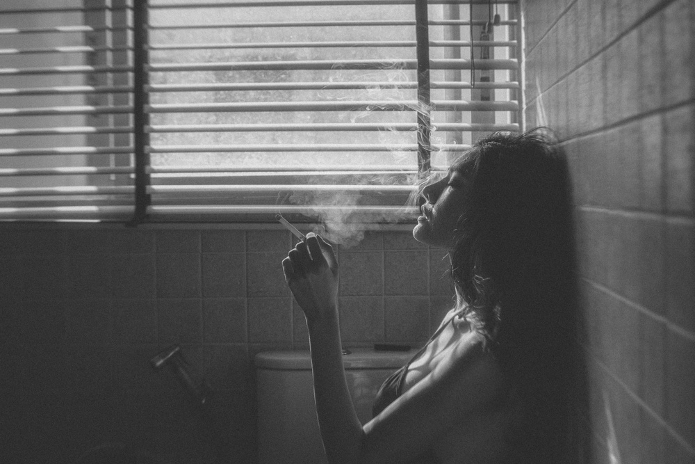 Pensive Woman Window Light by ADIREK M — canvas wall art