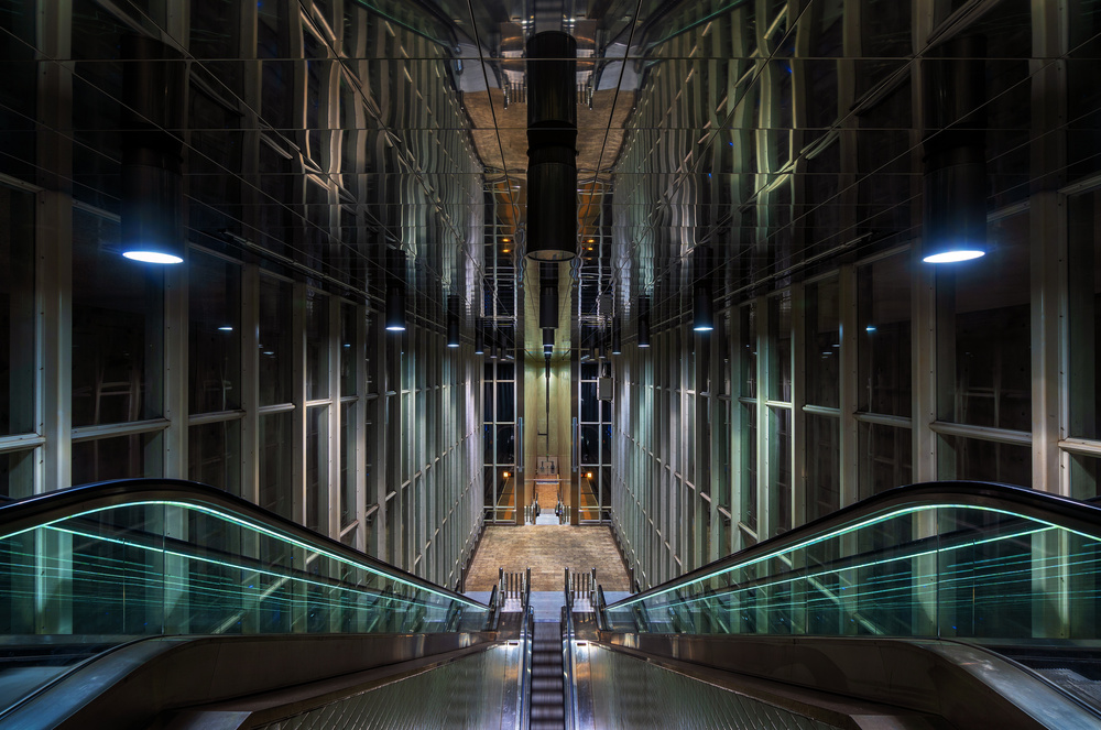 Sleek Escalator Reflections by Sus Bogaerts — canvas wall art