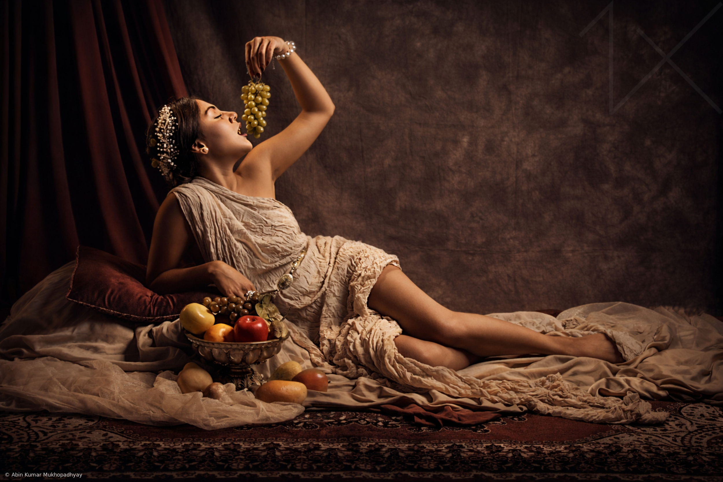 Lady with grapes