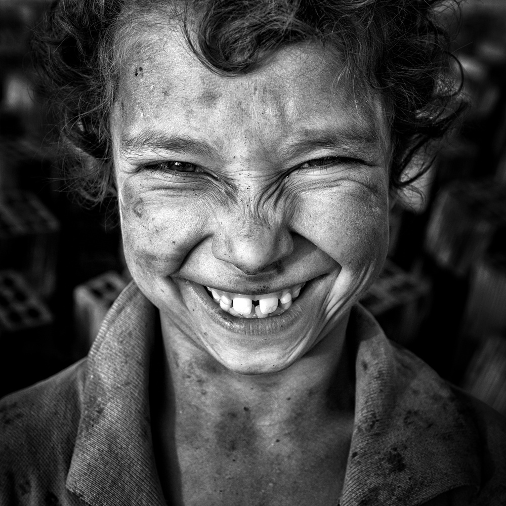 Child's Joyful Grin by Mohammadreza Momeni — canvas wall art