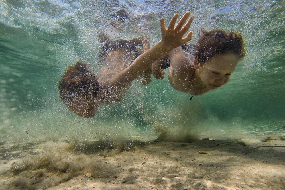 Boy Underwater Swim by Murat Aslankara — canvas wall art