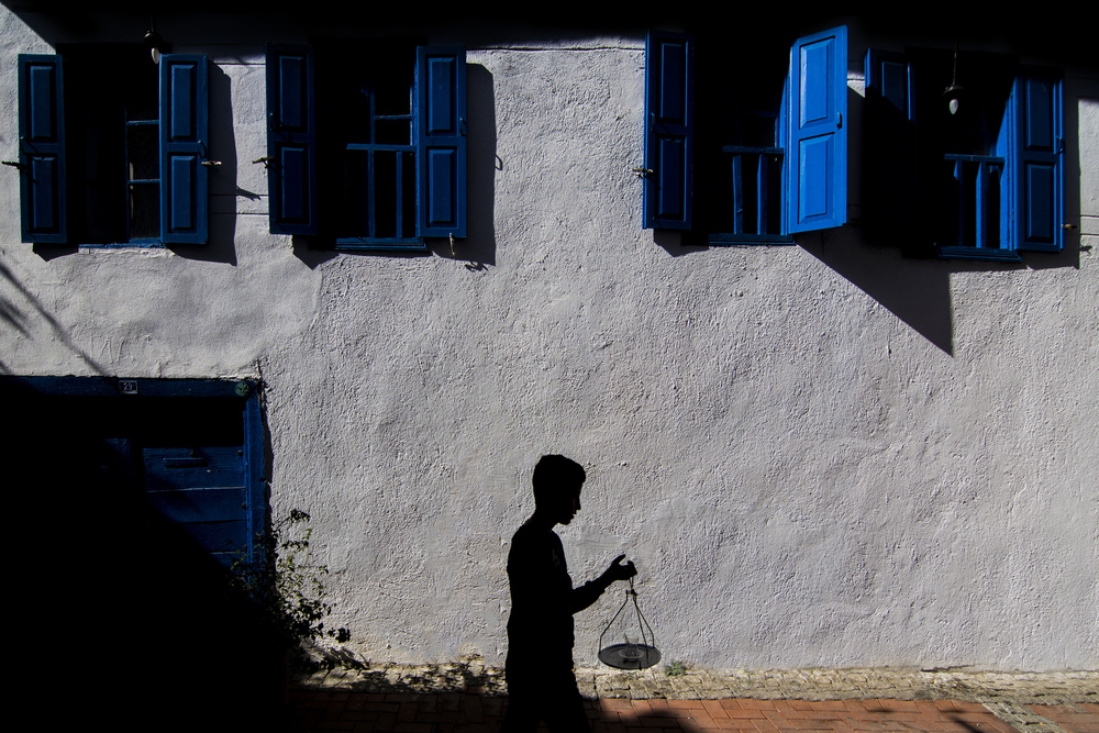 Silhouette Boy Blue Windows by Yasemin Bakan — canvas wall art