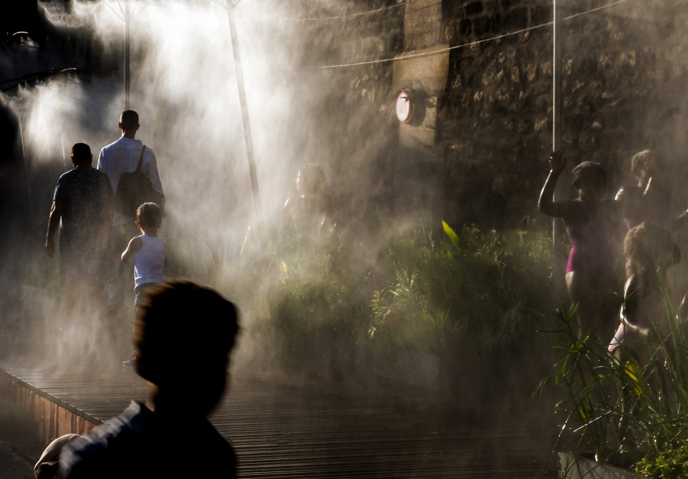Misty Urban Glow by Caroline Bomers — canvas wall art