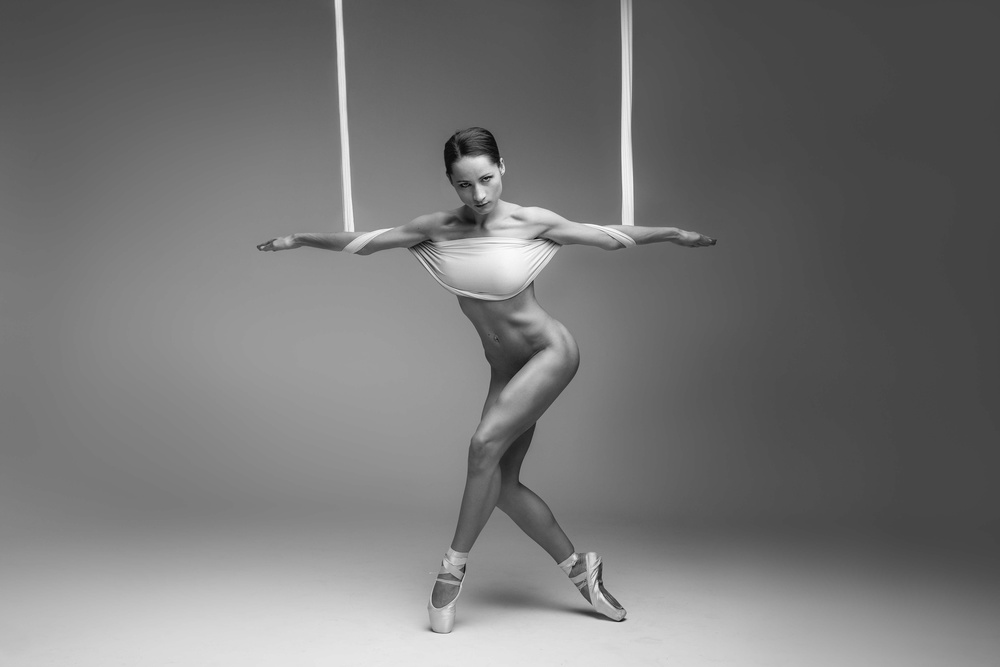 Elegant Ballerina Pose by Łukasz Kozłowski — canvas wall art