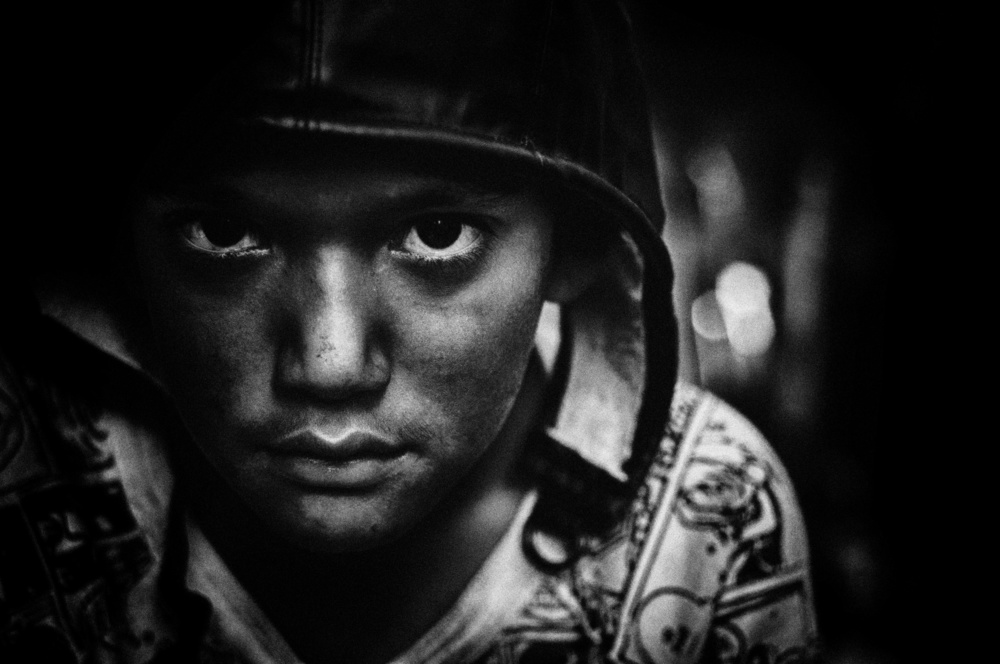 Intense Hooded Boy by Miki Meir Levi — canvas wall art