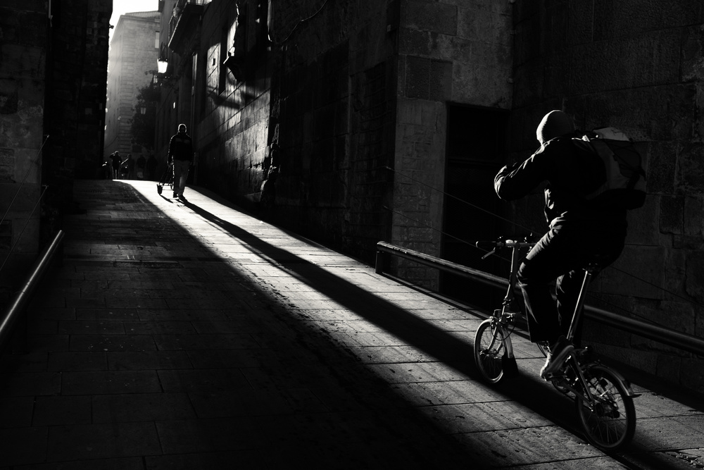 Street Light and Cyclist by Ignasi Raventos — canvas wall art