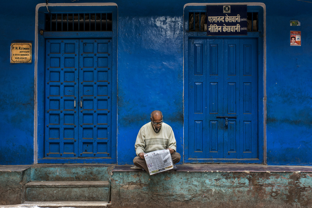Old Man Reading Blue Wall by Yasemin Bakan — canvas wall art
