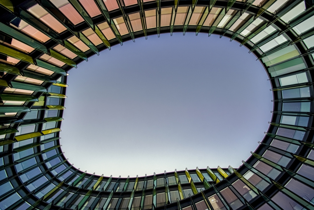 Curved Glass Building by Holger Schmidtke — canvas wall art