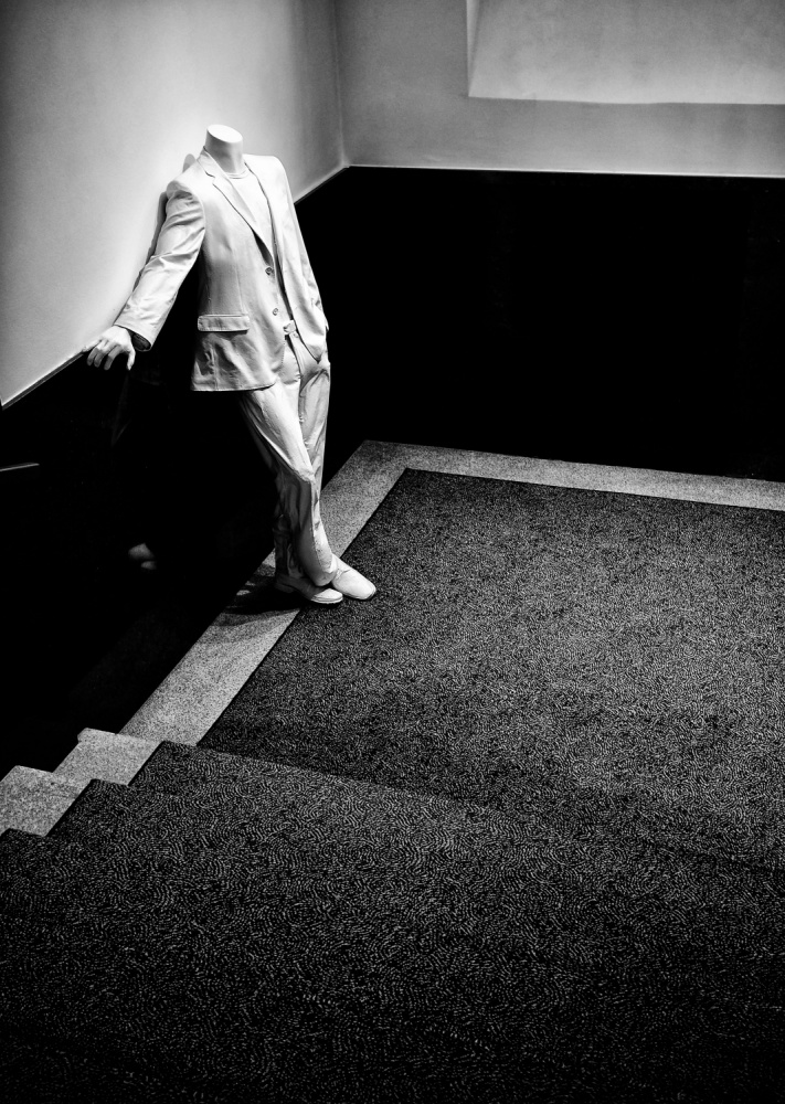 Elegant Headless Suit by ihyabozkurt — canvas wall art