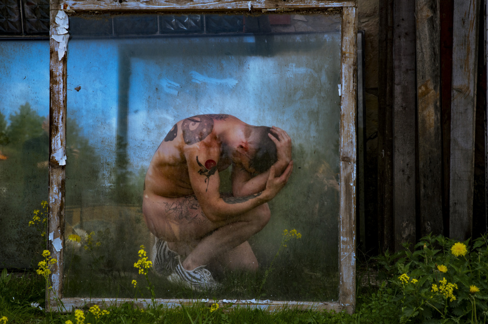 Vulnerable Man Behind Glass by Silvija Danelsone — canvas wall art