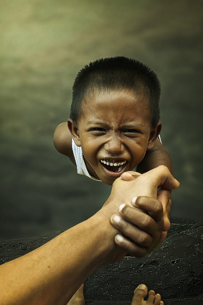 Desperate Child's Grip by Heru Sulistyono — canvas wall art