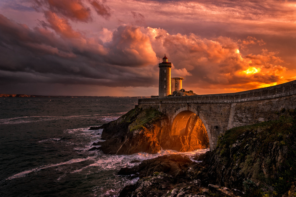 Stormy Lighthouse Sunset by Denis — canvas wall art