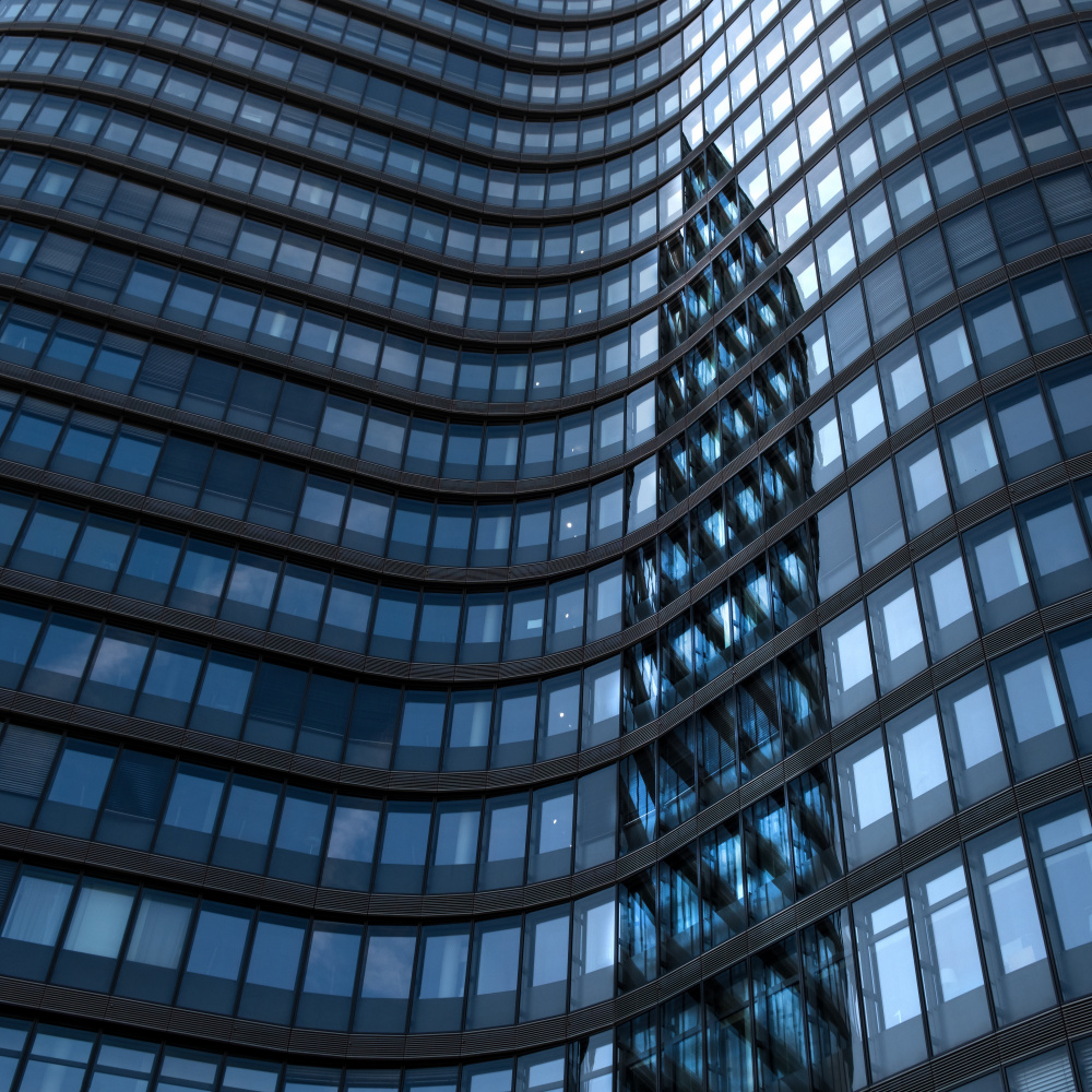 Curved Glass Building Reflection by Rolf Endermann — canvas wall art