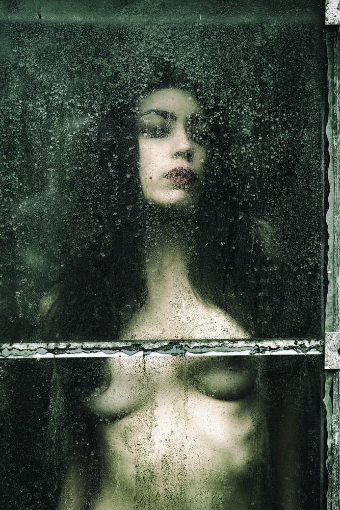 Woman Behind Wet Glass by Jacob Tuinenga — canvas wall art