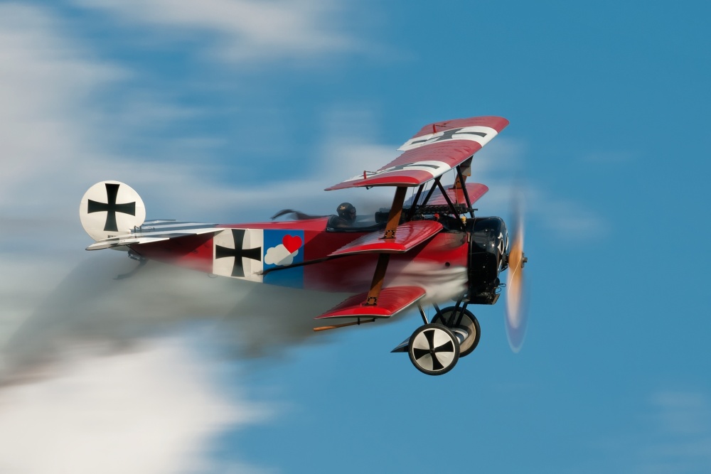 Historic Red Triplane Soaring by Darek Siusta — canvas wall art