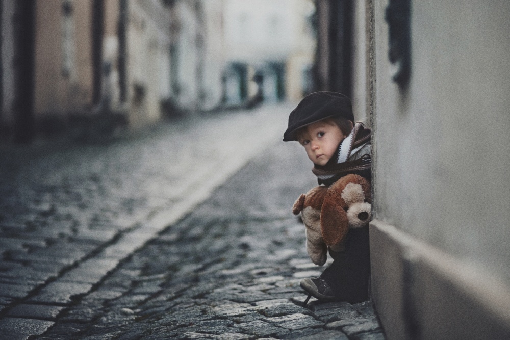Shy Child With Teddy by Tatyana Tomsickova — canvas wall art
