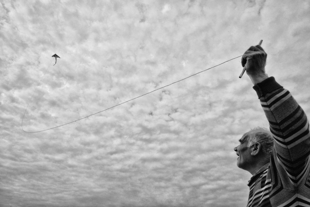 Old Man Flying Kite by ihyabozkurt — canvas wall art