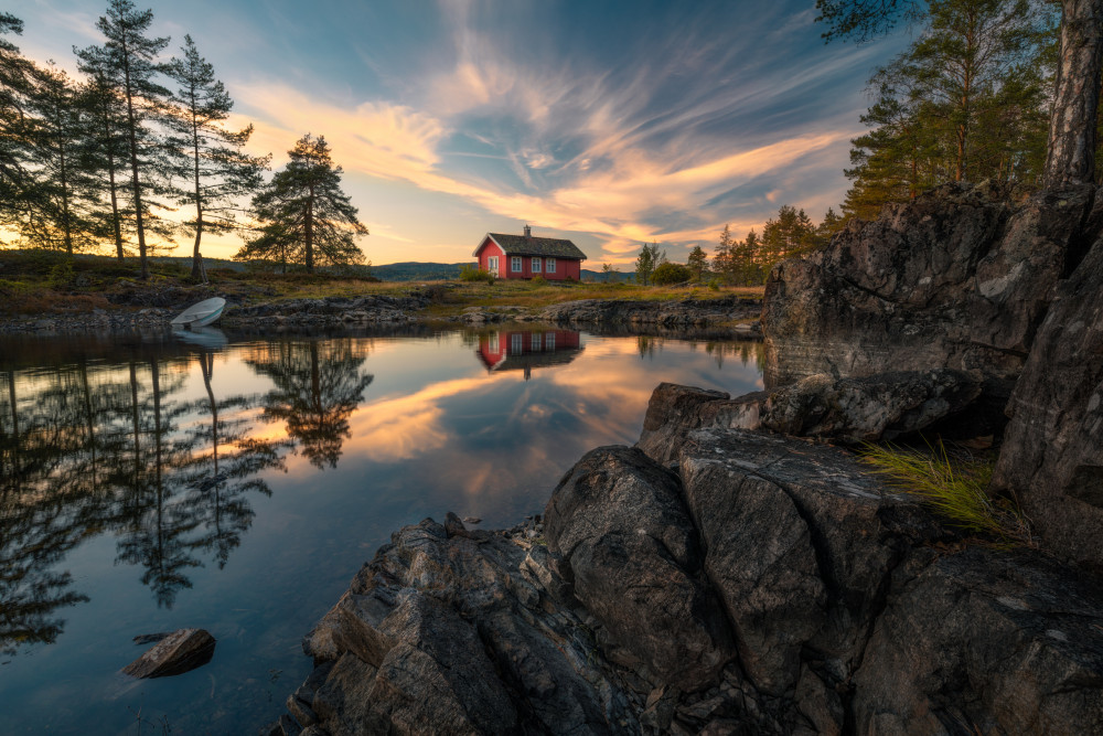 Red House on Lake Sunset by Ole Henrik Skjelstad — canvas wall art