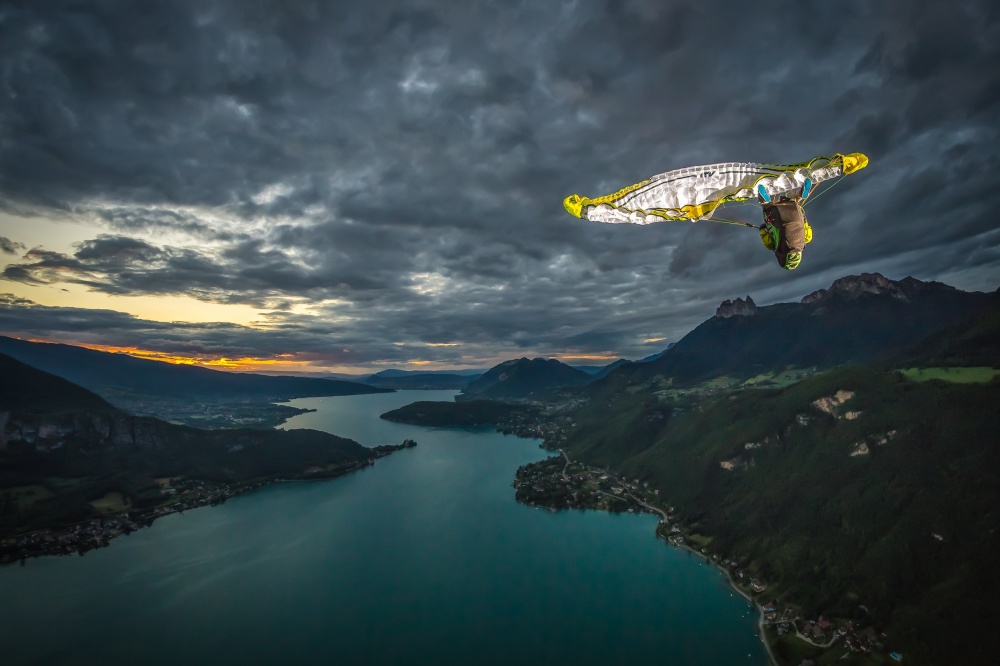 Wingsuit Over Mountain Lake by Tristan Shu — canvas wall art